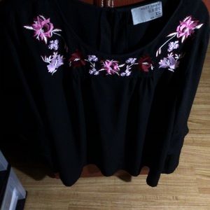 Black blouse , long sleeves